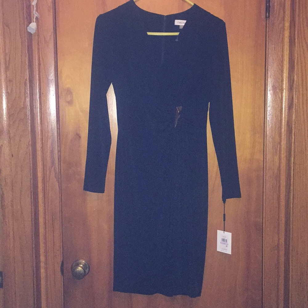 BRAND NEW women’s long sleeve black dress!
